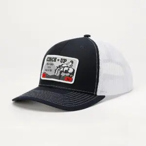 A black and white hat with a patch on it