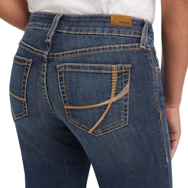 A close up of the back pocket on a pair of jeans