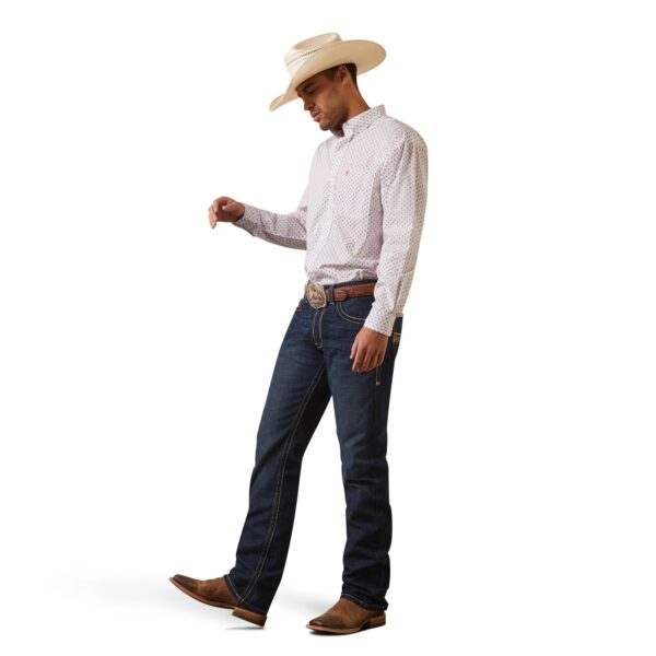 A man in cowboy hat and jeans standing on white background.