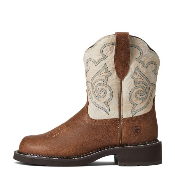 A brown and white cowboy boot with a black sole.