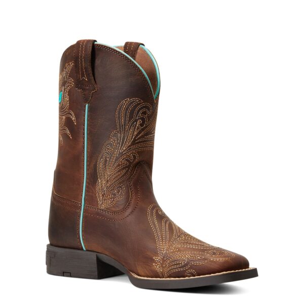A brown cowboy boot with turquoise trim on top of it.