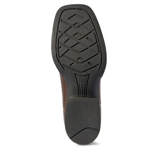 A sole of a shoe with the heel and toe in the middle.