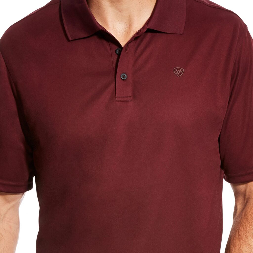 A man wearing a maroon polo shirt.