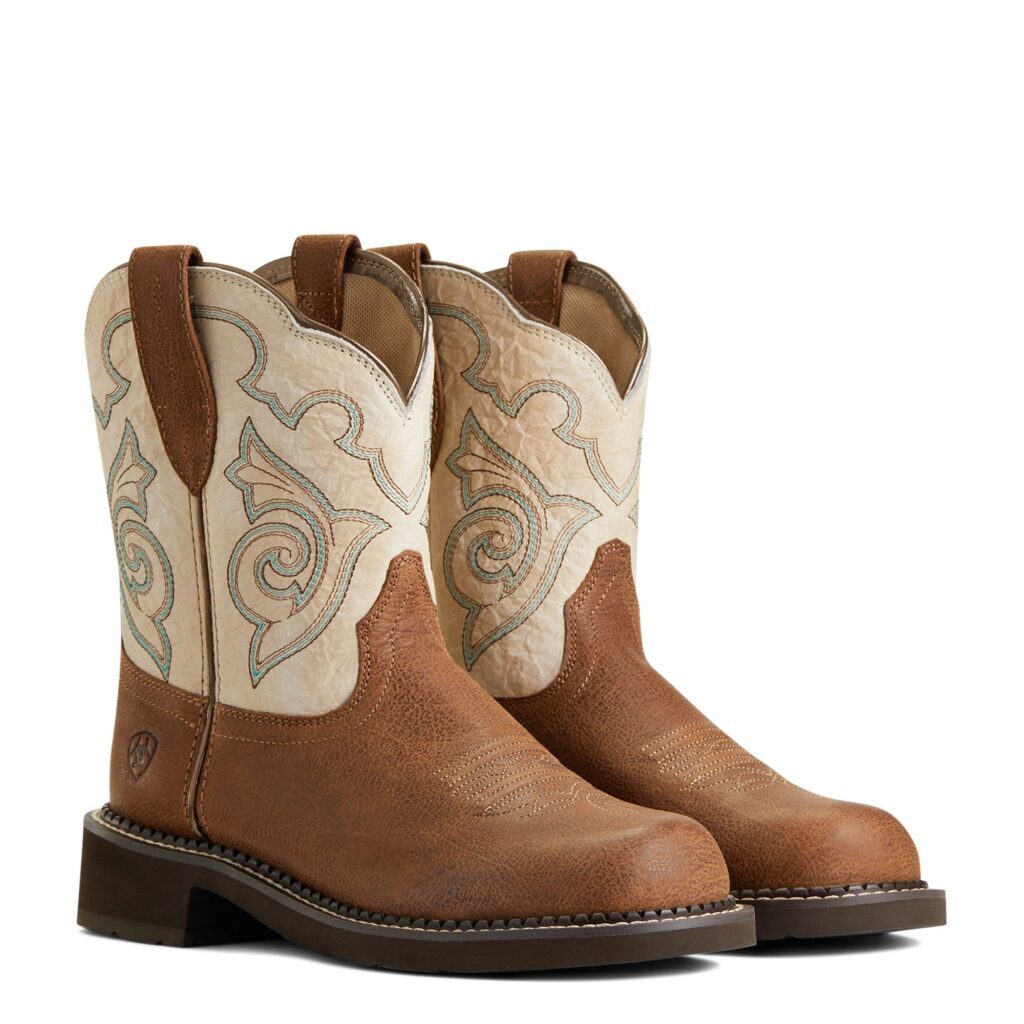 A pair of brown and white cowboy boots.